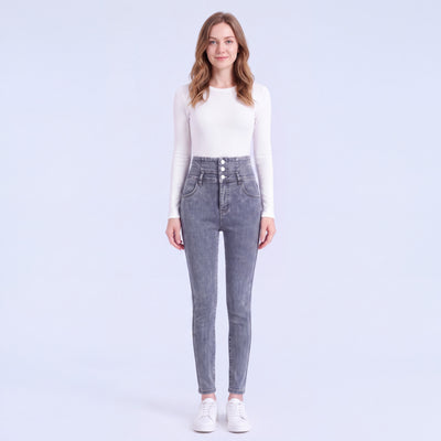Model wearing Stella fleece-lined high-rise jeans in Blue Gray, full length
