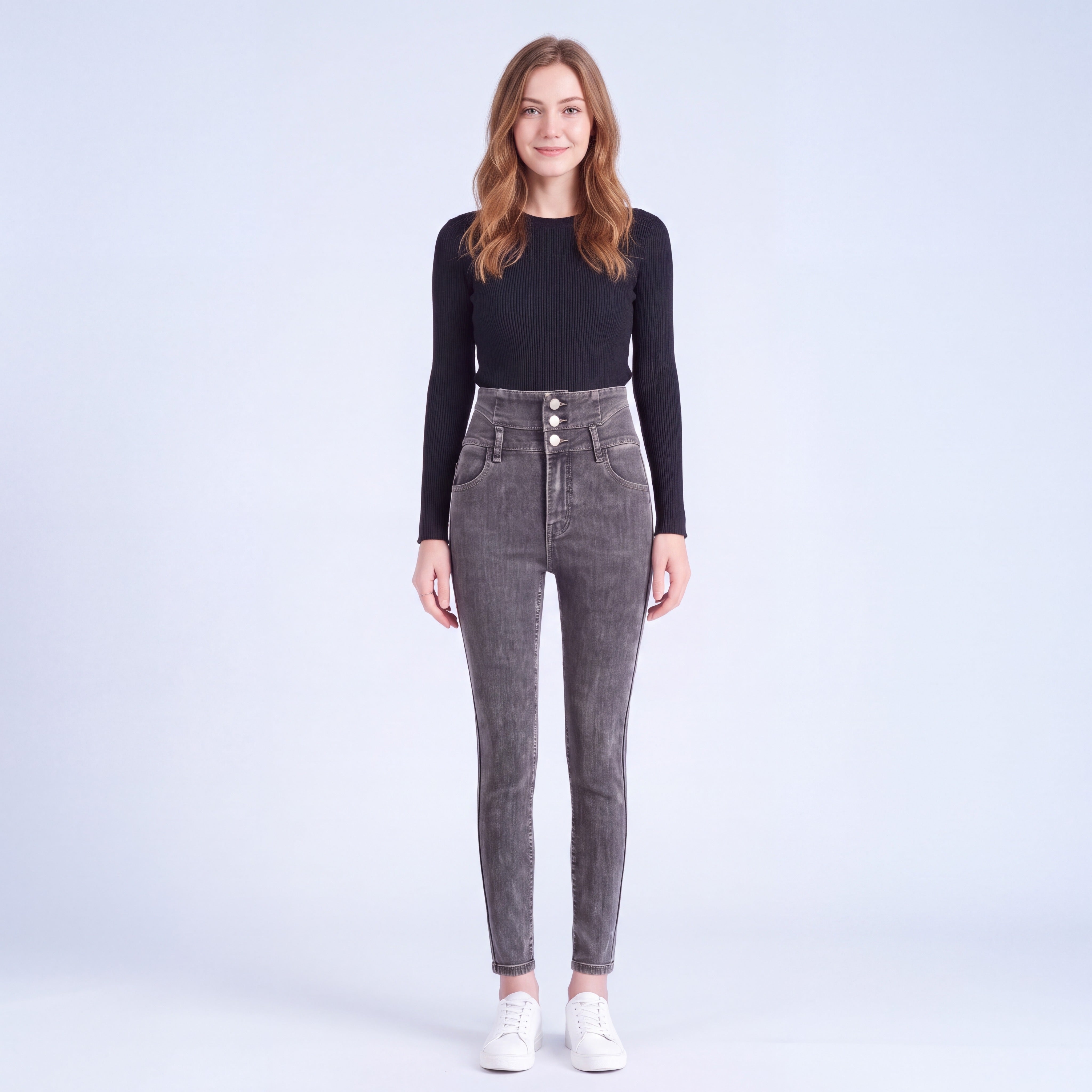 Model wearing Stella fleece-lined high-rise jeans in Dark Gray, full length