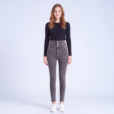 Model wearing Stella fleece-lined high-rise jeans in Dark Gray, full length